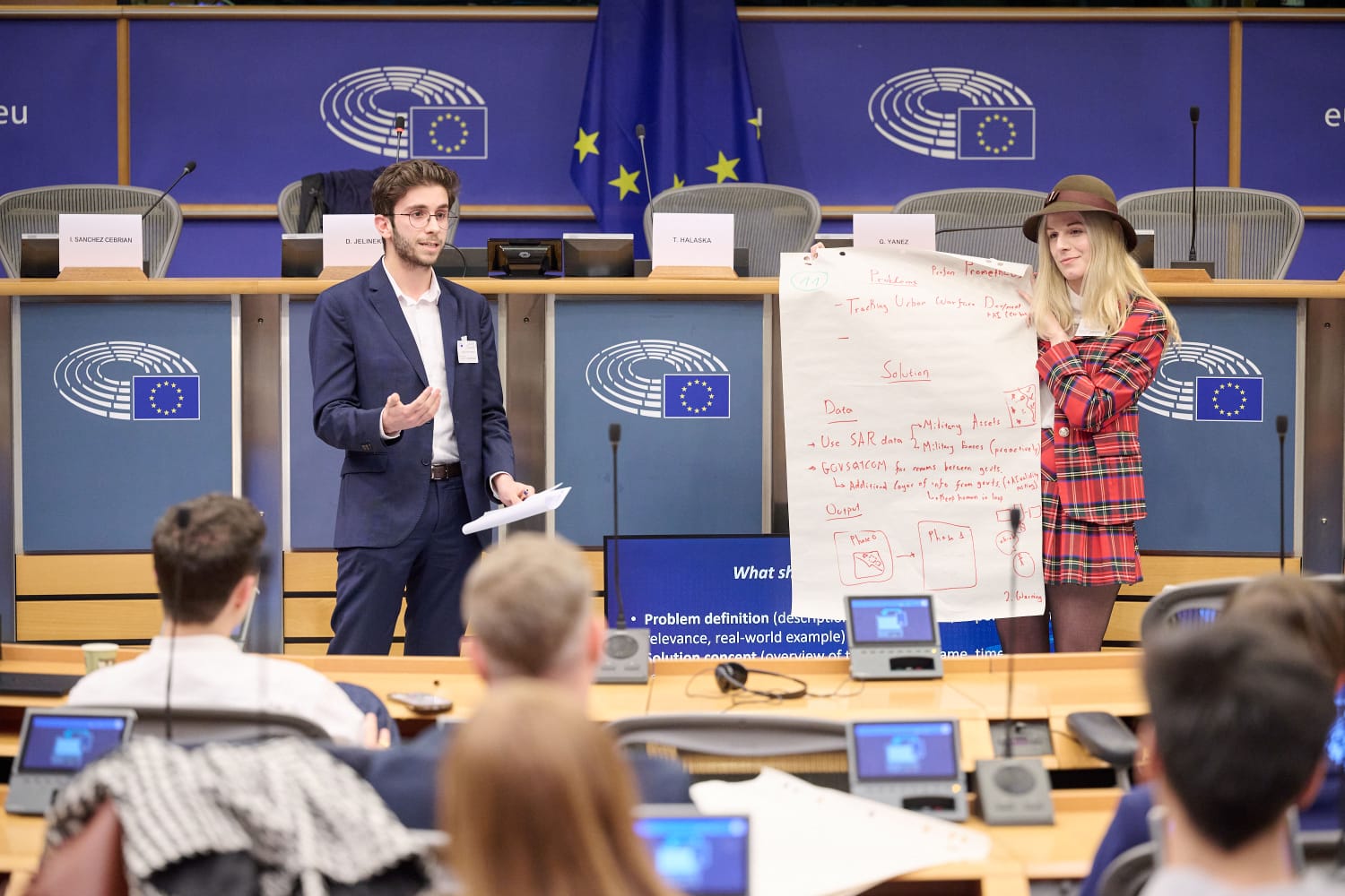 Christos speaking at the European Parliament